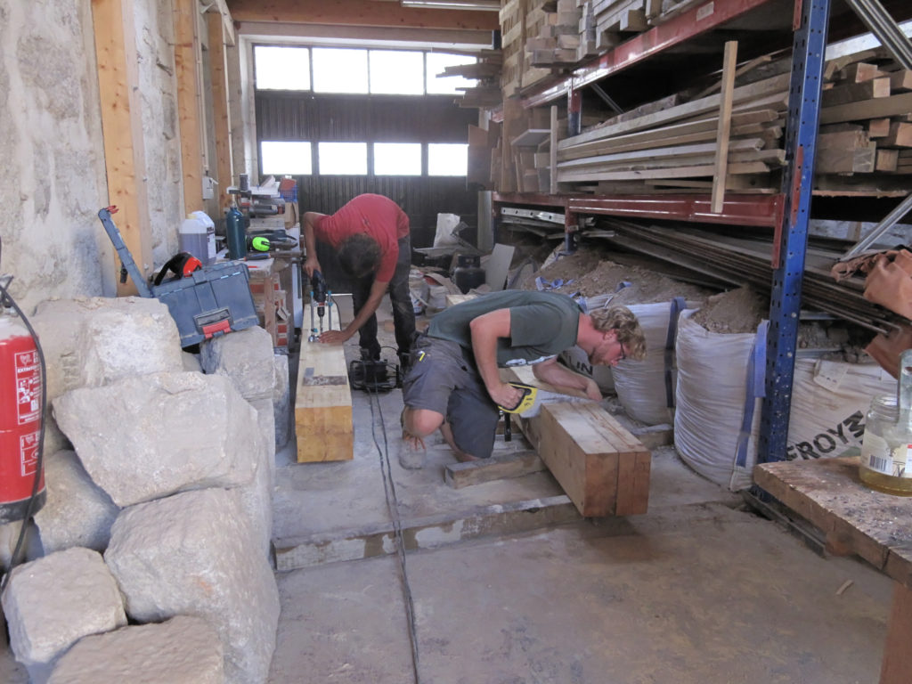 2 men working in workshop